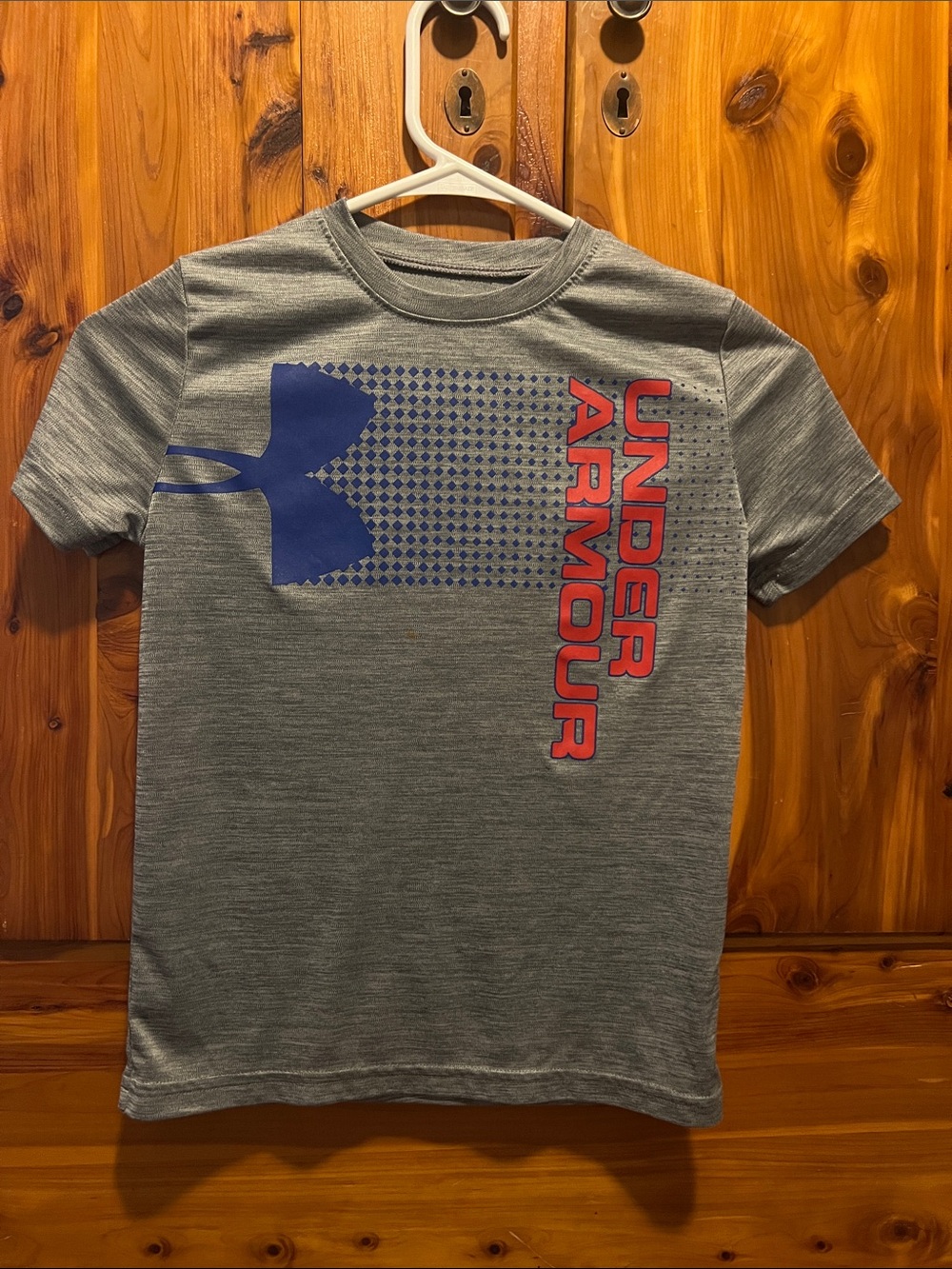 Under Armour Gray Tee with Blue Logo and Red Lettering